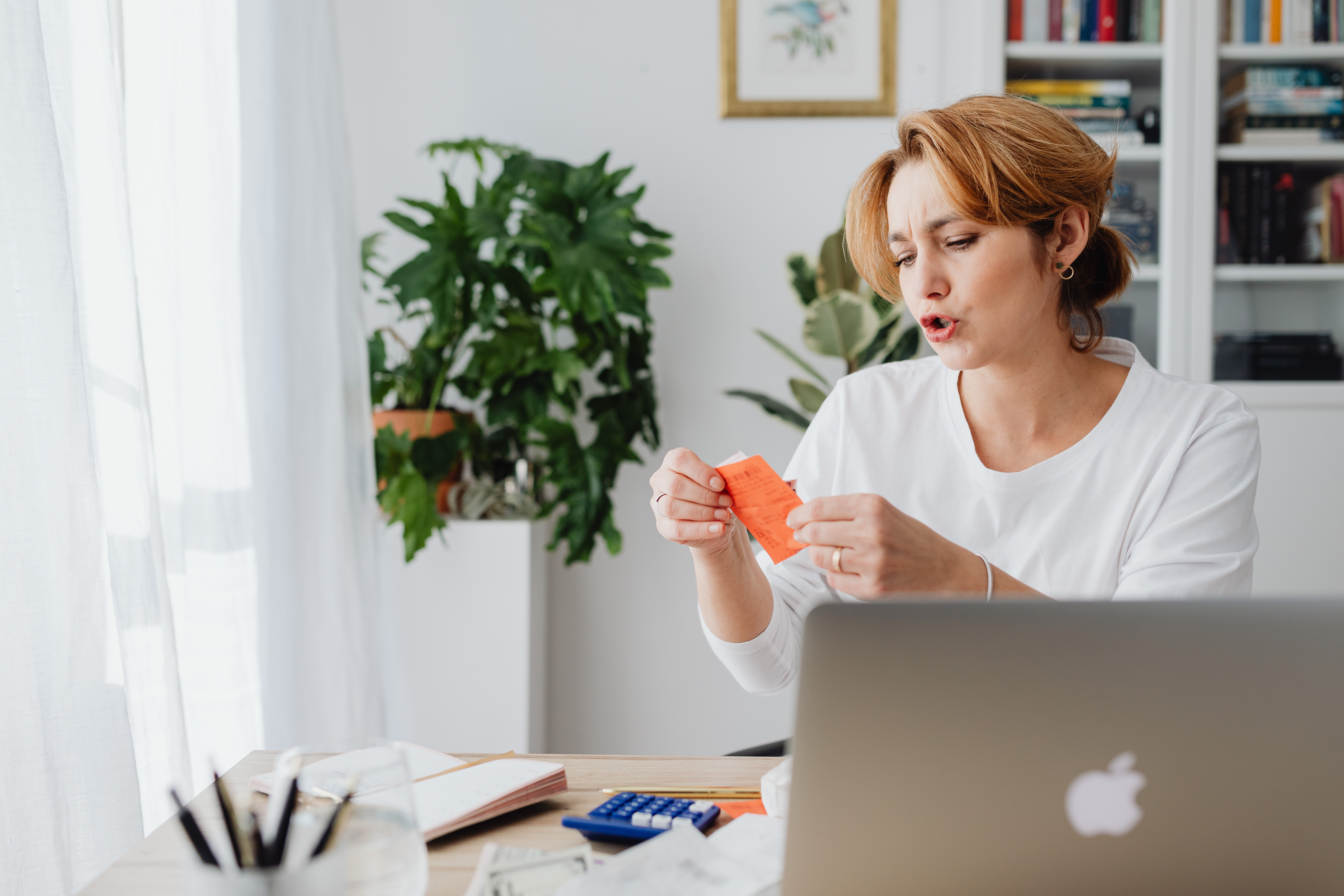 Woman reducing her spending online