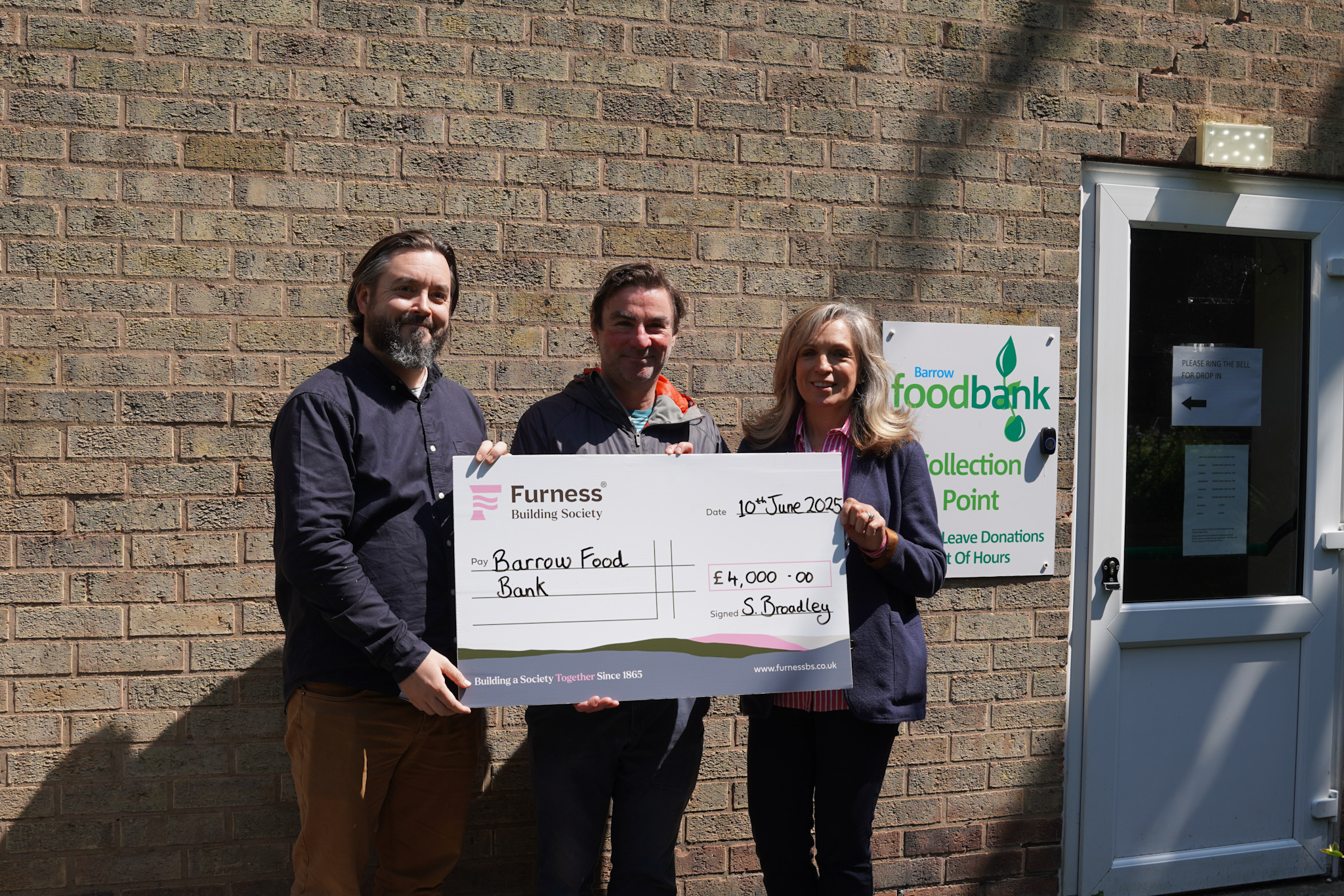 Furness Building Society present donation to Barrow Foodbank
