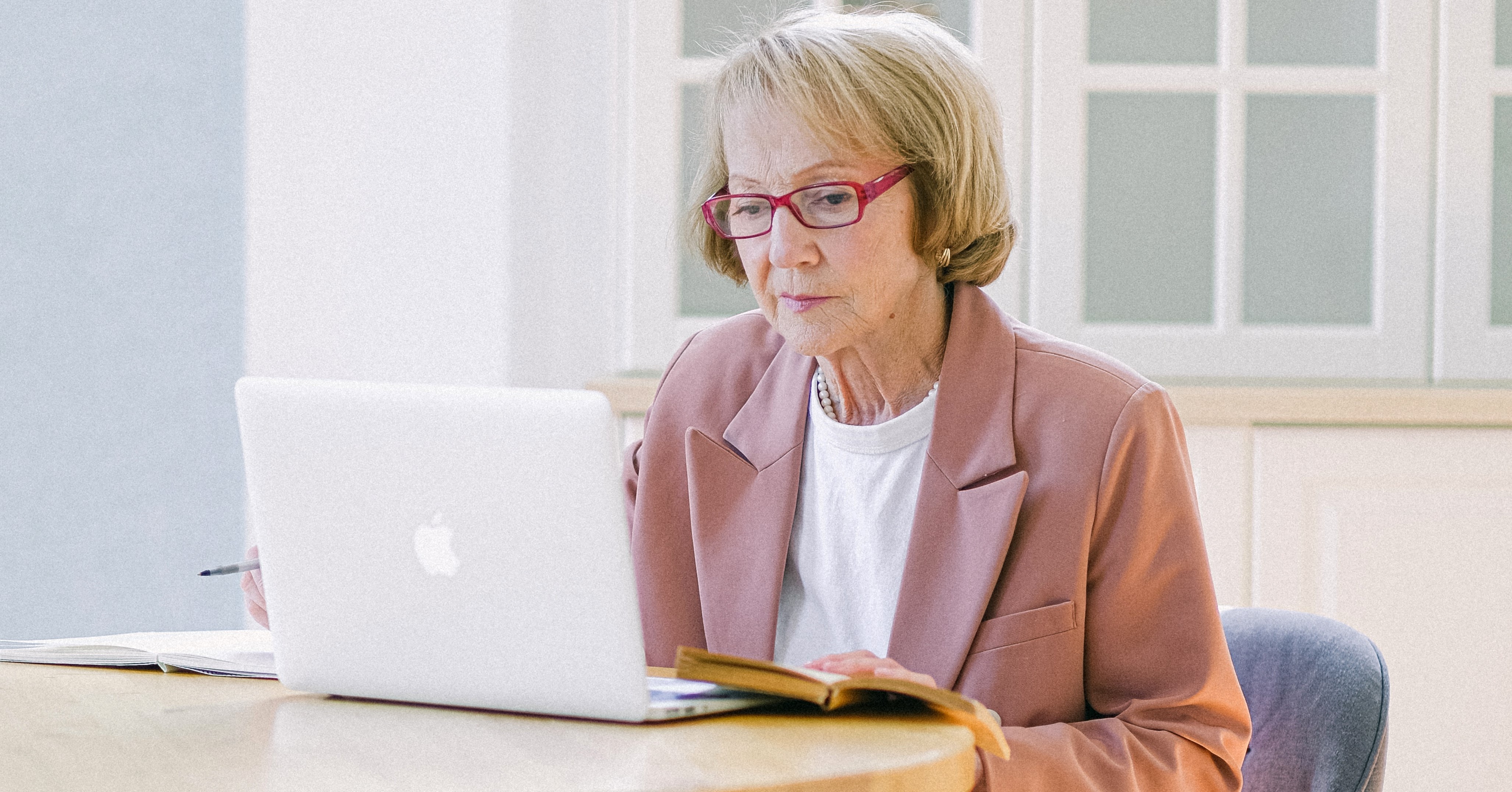 A woman working on a laptop