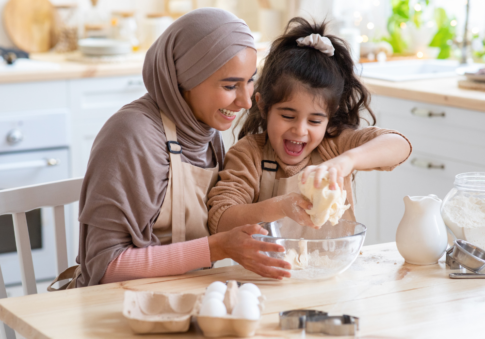 Mother and daughter baking in the kitchen