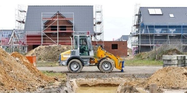 A construction vehicle on a housing development site