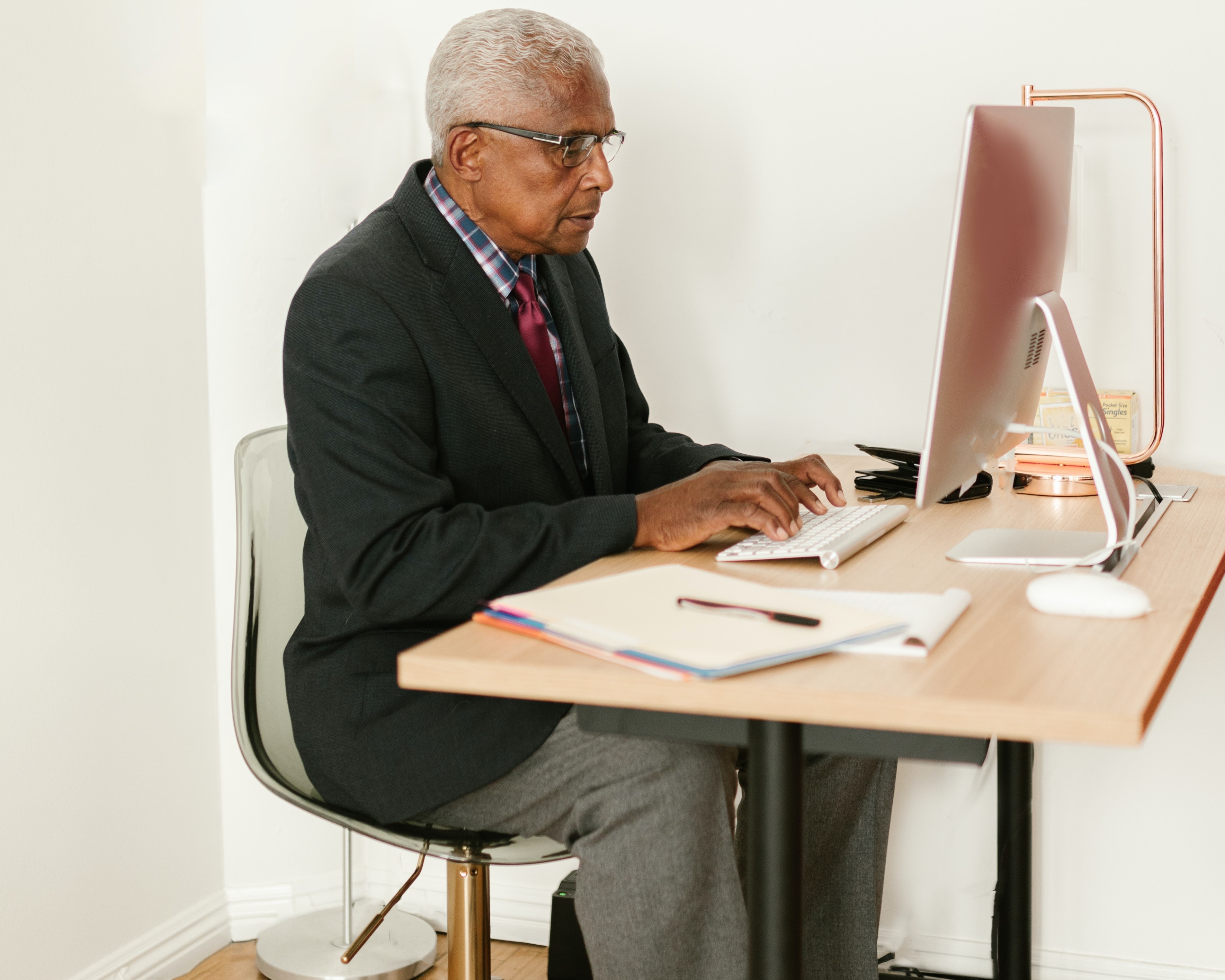 Older man working at computer