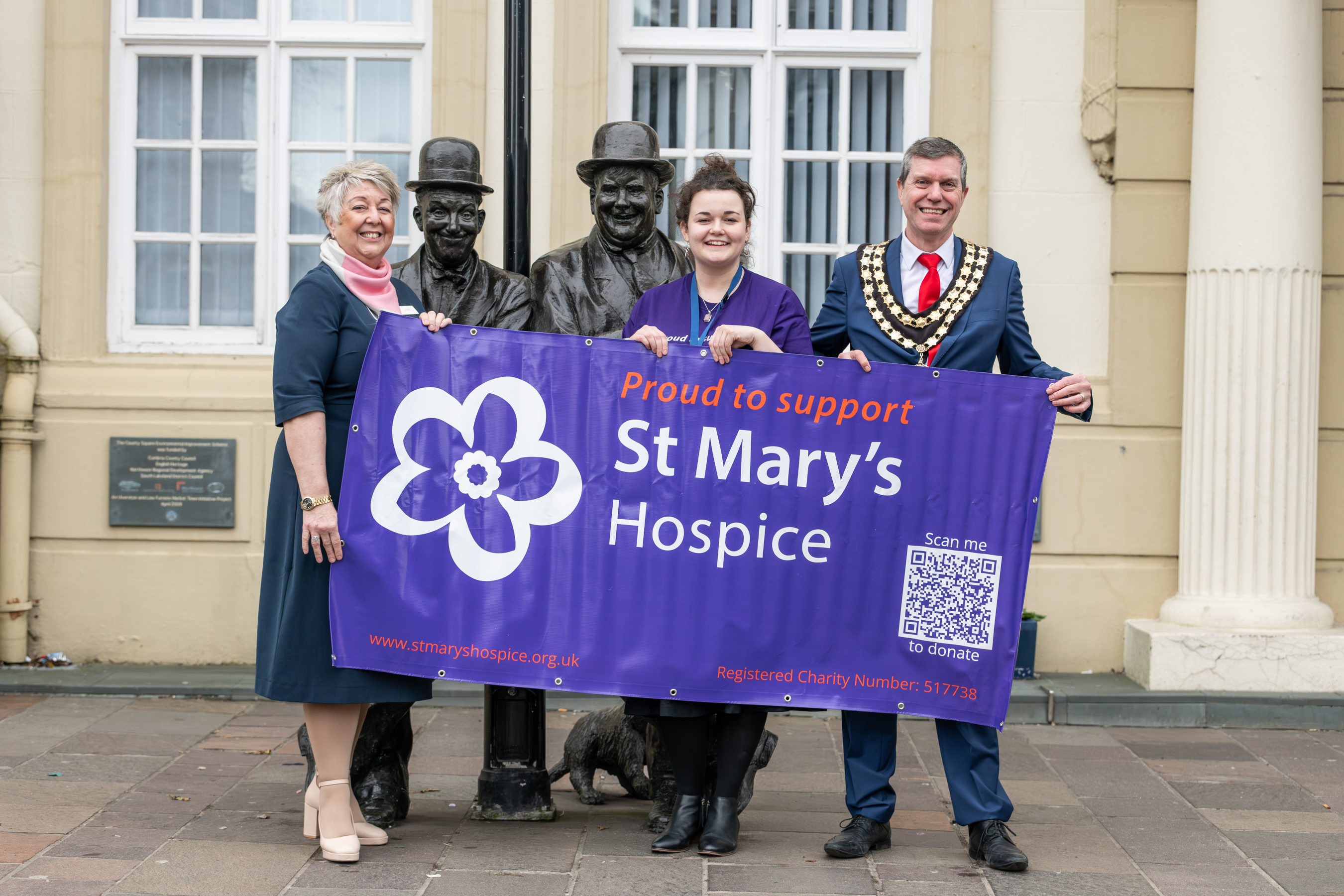 Ulverston branch team with St Mary's Hospice representative